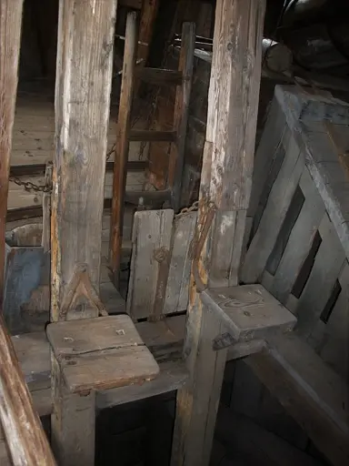 A photo of a Man Engine, showing the vertical wooden beams with the foot platforms.